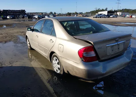 2003 Toyota Camry Le z USA, uszkodzony, nr VIN 4T1BE32K73U137925